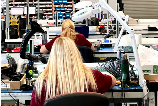 Assembly line working on PCB assembly